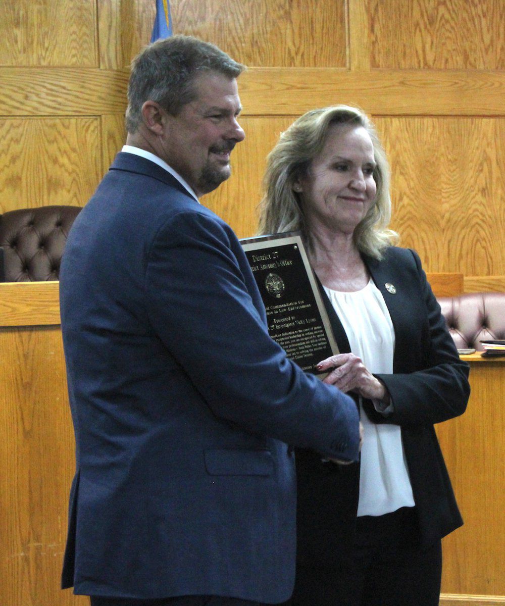 Area law officials honored by district attorney